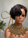 Glueless pixie cut wig with soft waves, creating an elegant yet playful look for Black women