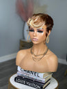 Glueless pixie wig with curls, adding bounce and volume for African American hair.