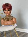 Glueless red pixie wig, a vibrant and stylish choice for African American women.