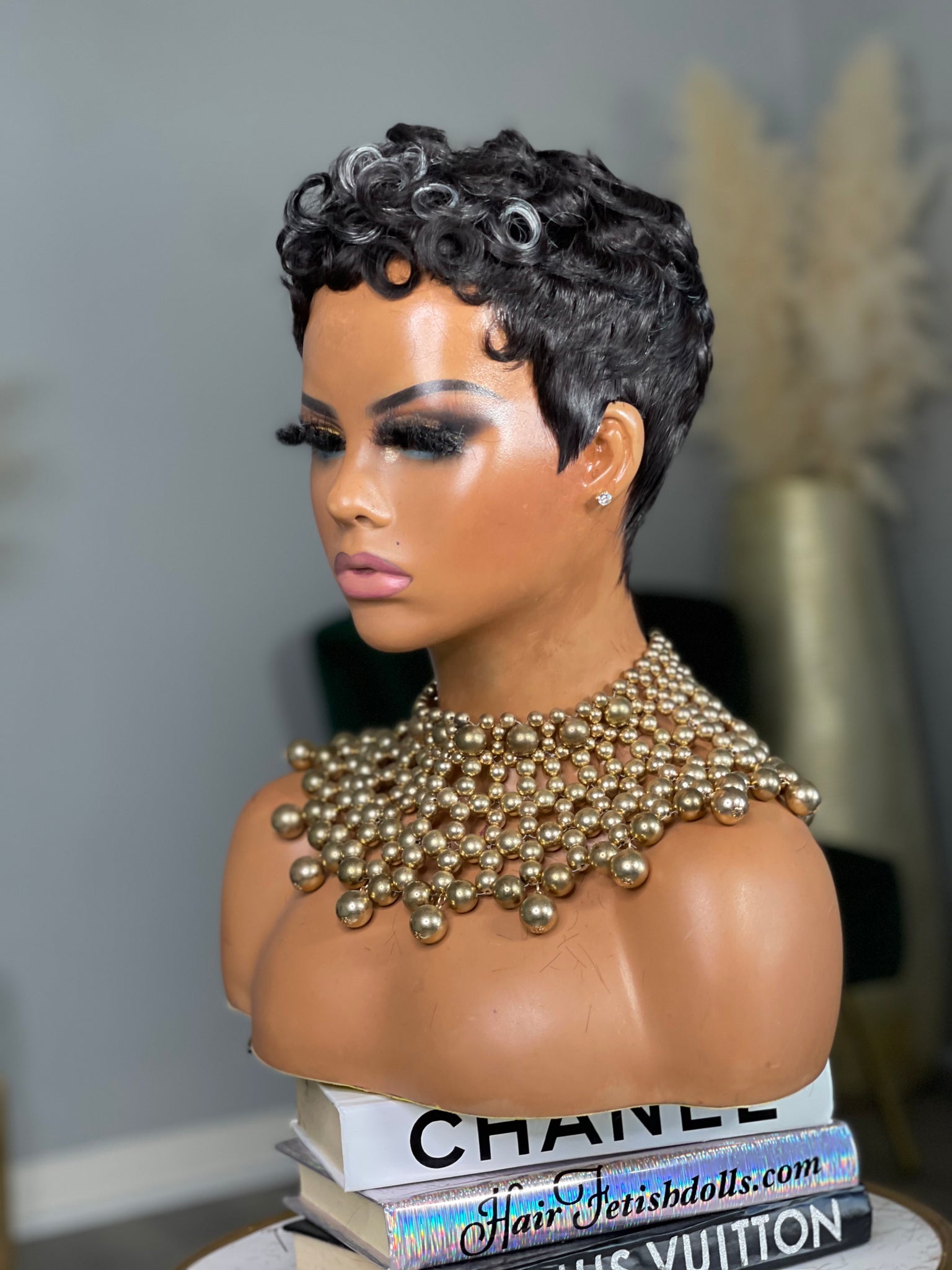 Glueless layered pixie wig in black hair, providing a stylish and modern look for Black women.