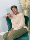 Glueless layered pixie wig in black hair, providing a stylish and modern look for Black women.