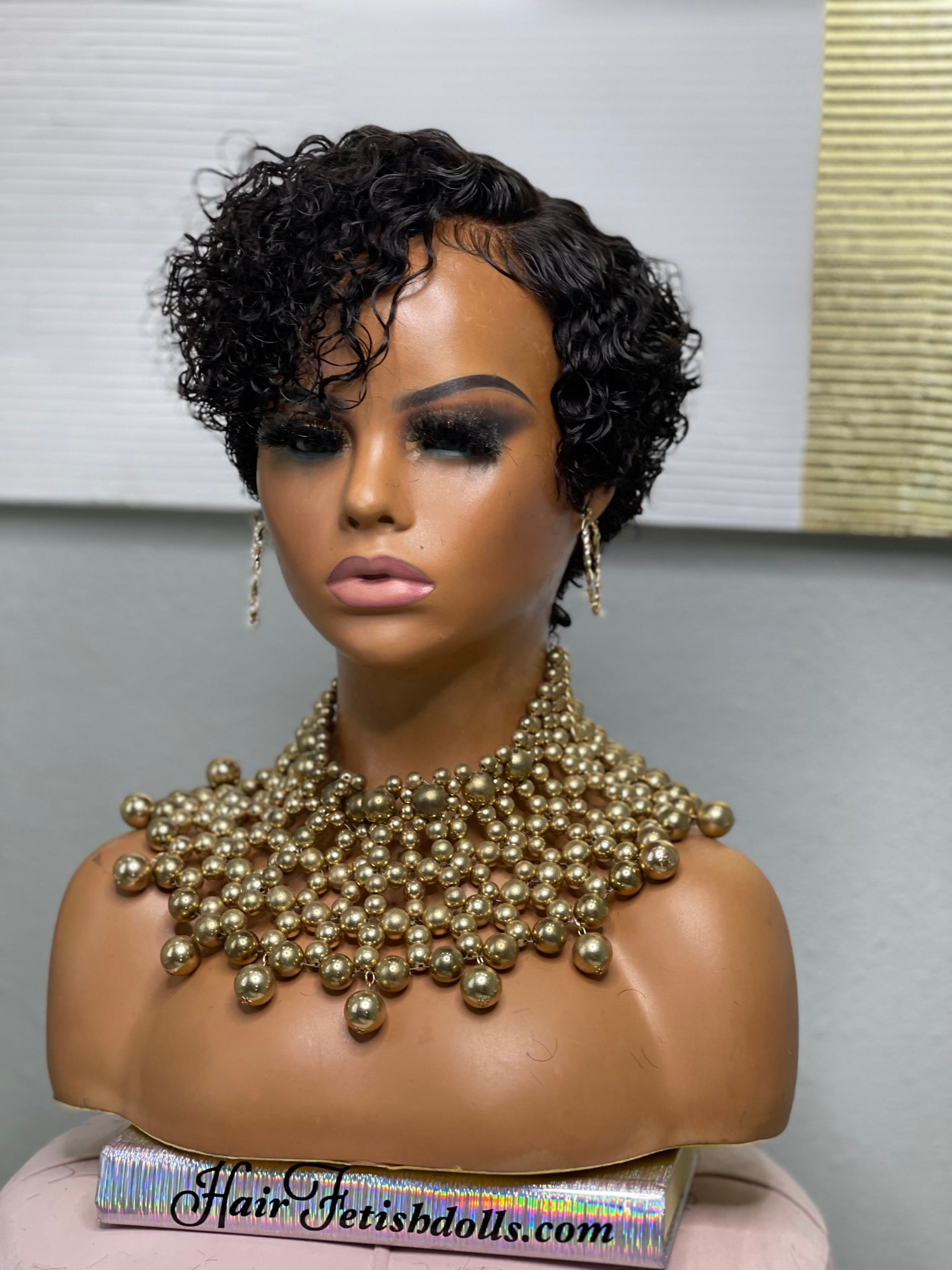 Glueless pixie wig with deep part, designed for a realistic scalp look for African American women.