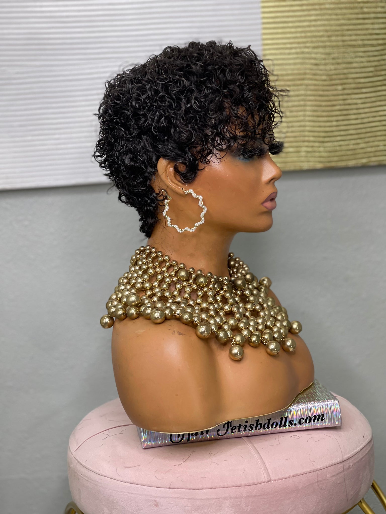 Glueless pixie wig with deep part, designed for a realistic scalp look for African American women.