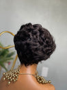 Glueless pixie cut wig with soft waves, creating an elegant yet playful look for Black women