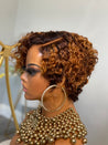 Short glueless pixie wig with highlights, adding warmth and dimension for African American hair.