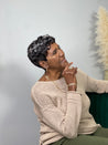 Glueless layered pixie wig in black hair, providing a stylish and modern look for Black women.