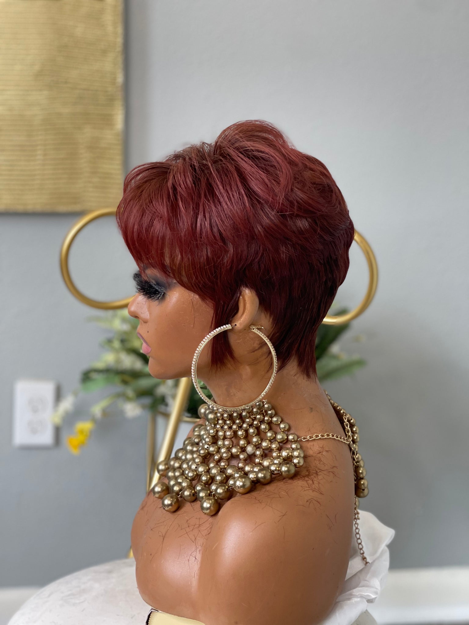Glueless red pixie wig, a vibrant and stylish choice for African American women.