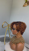 Short glueless pixie wig with highlights, adding warmth and dimension for African American hair.