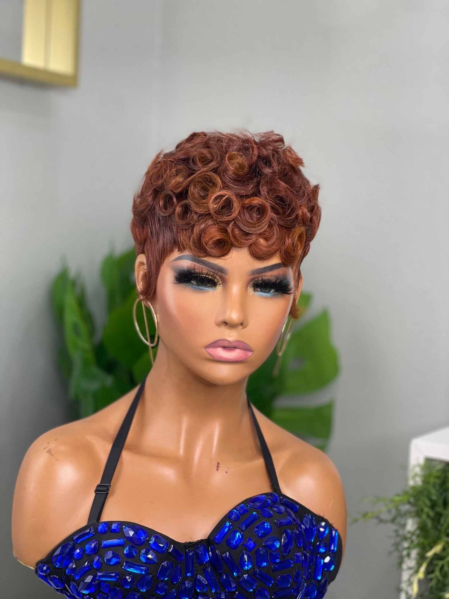 Glueless red pixie wig, a vibrant and stylish choice for African American women.