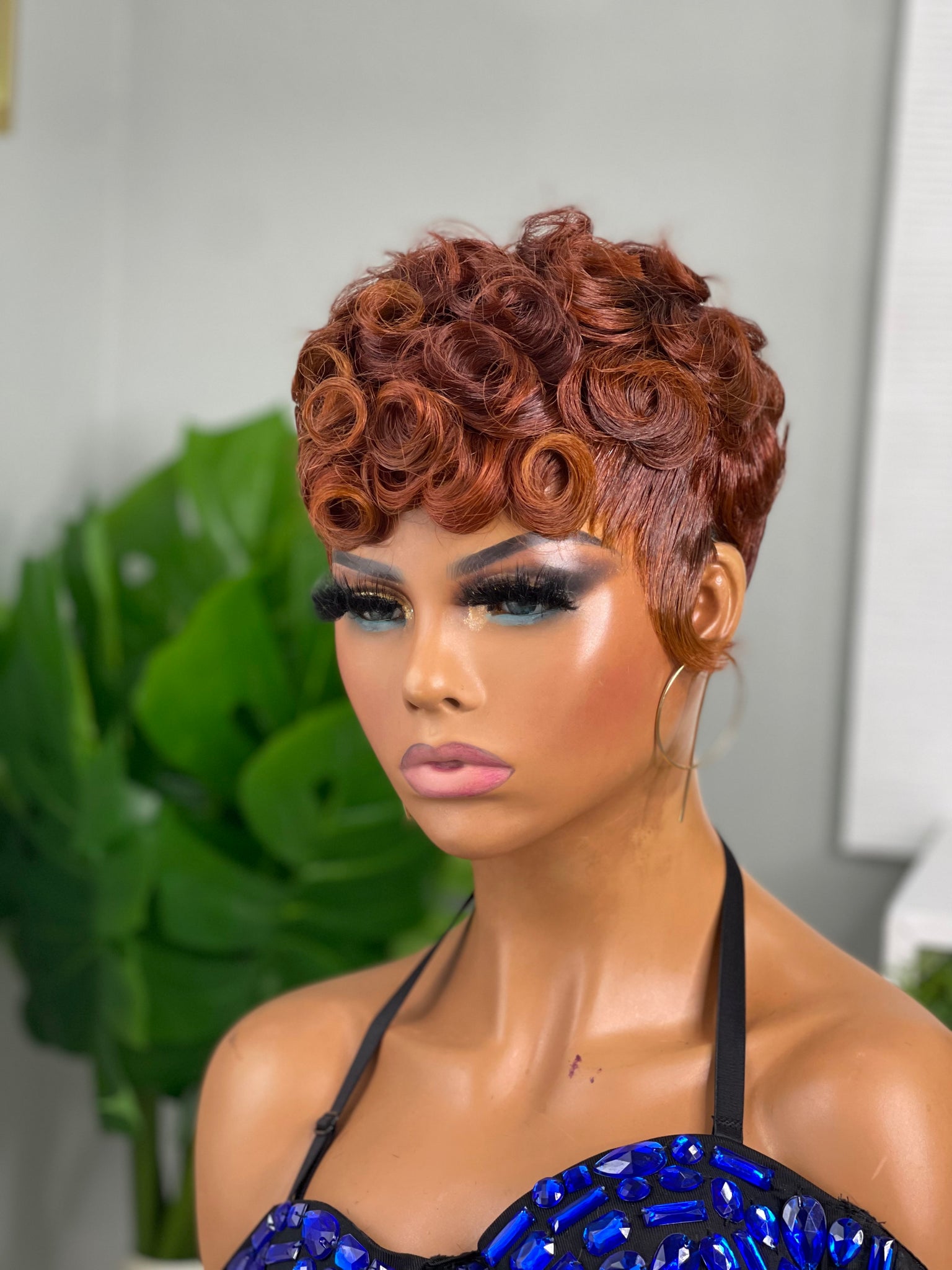 Glueless red pixie wig, a vibrant and stylish choice for African American women.