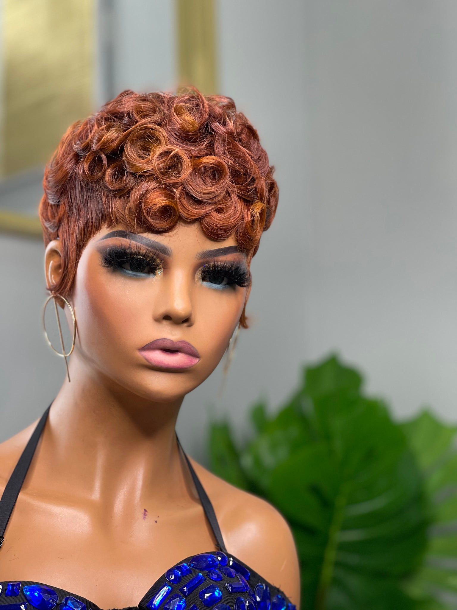Glueless red pixie wig, a vibrant and stylish choice for African American women.