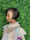 Razor cut bob wig with feathered edges for a soft, voluminous effect.
