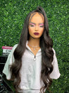 Glueless long curly wig providing luxurious, volume