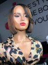 Short glueless bob wig with a soft curl pattern for a feminine look.